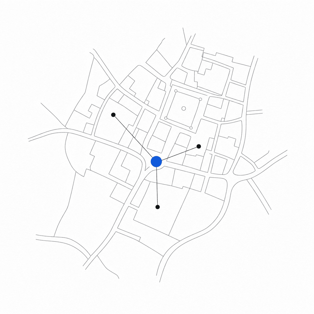 Plan schématique d'une ville : un point bleu relié à trois points voisins.